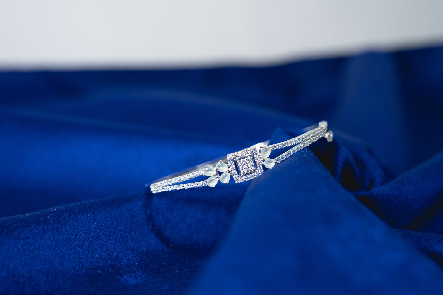 Fancy Bangle Embedded with Stones 925