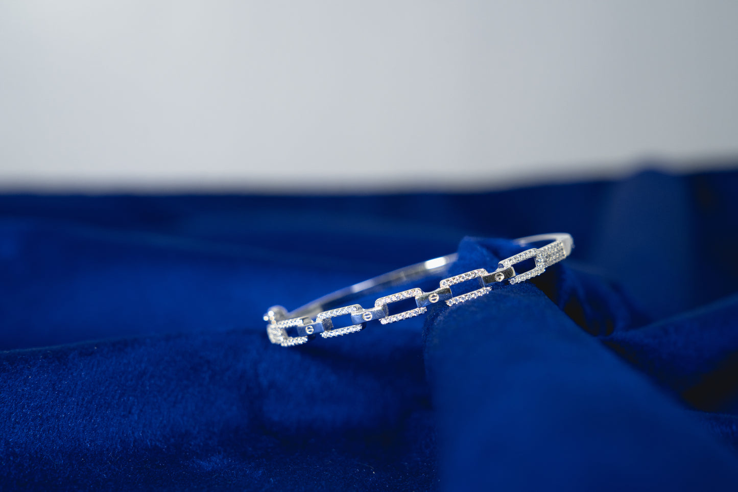 Fancy Bangle Embedded with Stones 925