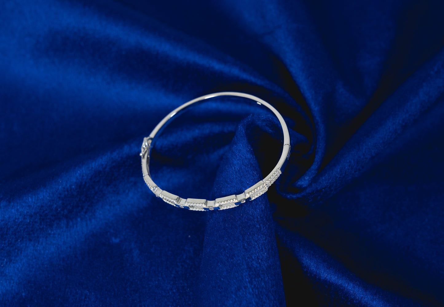 Fancy Bangle Embedded with Stones 925