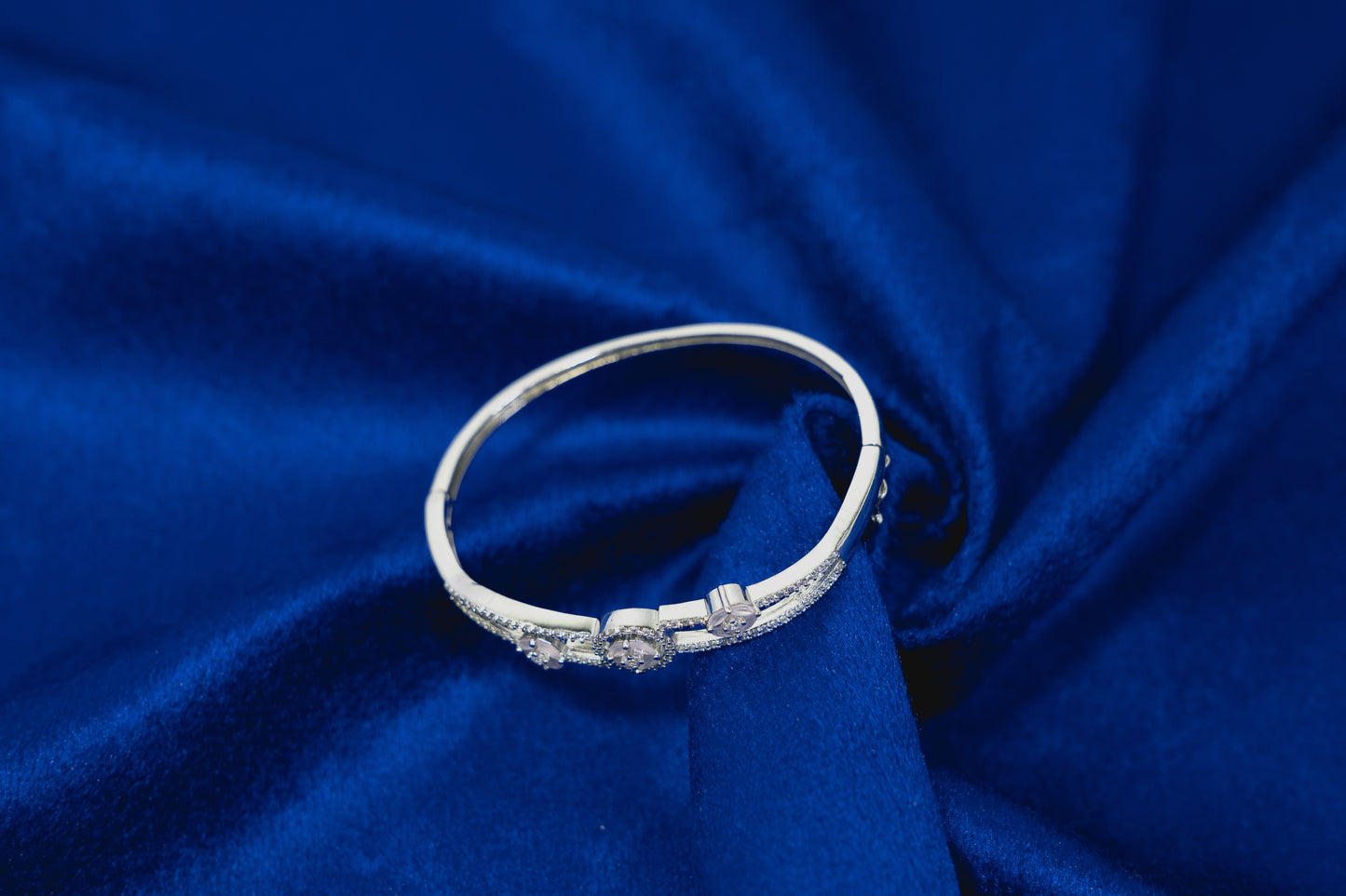 Fancy Bangle Embedded with Stones 925